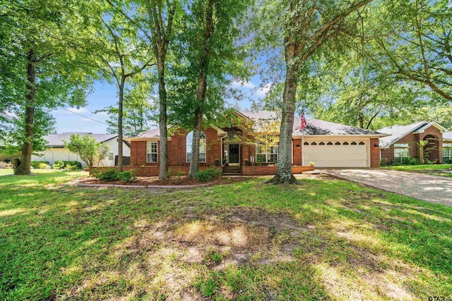 single story home with a garage and a front lawn