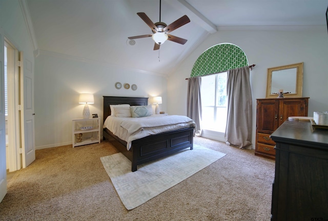 carpeted bedroom with access to outside, ceiling fan, and vaulted ceiling with beams