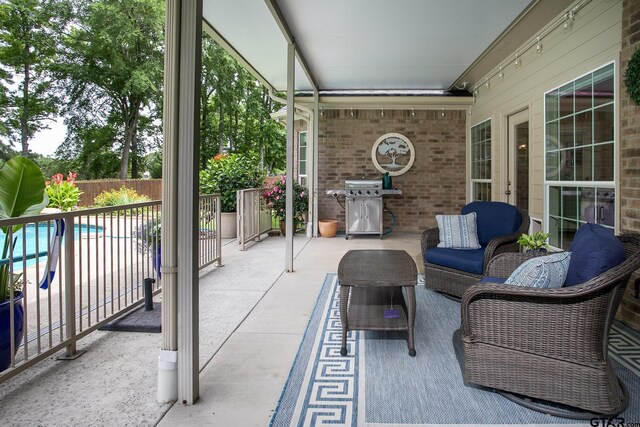 11208 Marsh Wren Cir, Flint, TX 75762 - view of patio with area for grilling and an outdoor living space