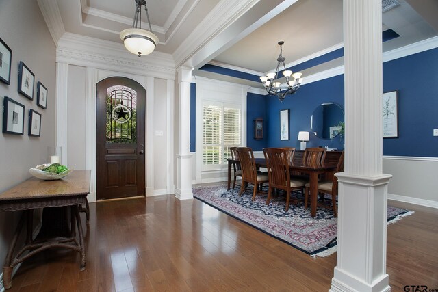 11208 Marsh Wren Cir, Flint, TX 75762 - foyer entrance featuring ornate columns, a tray ceiling, wood finished floors, and ornamental molding