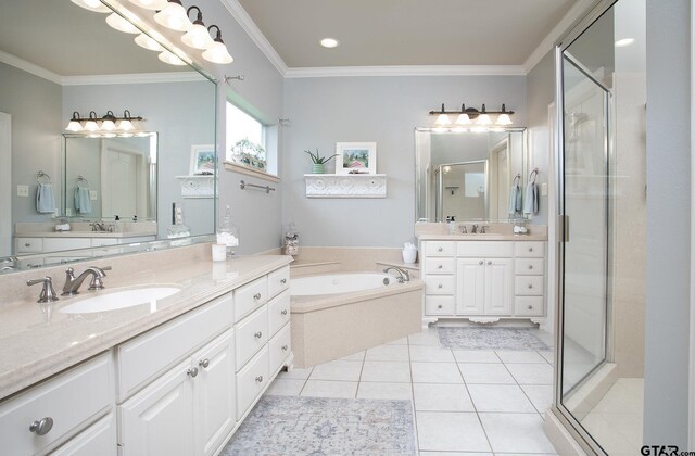 11208 Marsh Wren Cir, Flint, TX 75762 - full bath featuring a shower stall, two vanities, a bath, crown molding, and tile patterned flooring