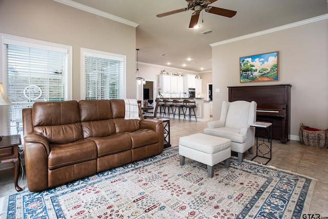 11208 Marsh Wren Cir, Flint, TX 75762 - living area with ornamental molding, a ceiling fan, and light tile patterned floors