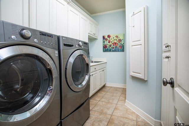 11208 Marsh Wren Cir, Flint, TX 75762 - laundry room with separate washer and dryer, cabinet space, ornamental molding, and light tile patterned floors