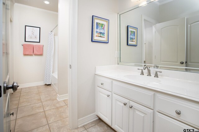 11208 Marsh Wren Cir, Flint, TX 75762 - full bath featuring crown molding, vanity, tile patterned floors, and shower / bath combo with shower curtain
