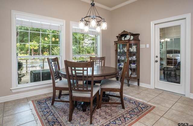 11208 Marsh Wren Cir, Flint, TX 75762 - dining area featuring a chandelier, ornamental molding, and light tile patterned flooring