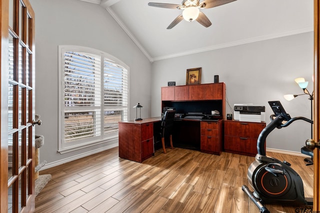 office area featuring vaulted ceiling, crown molding, ceiling fan, and light hardwood / wood-style floors