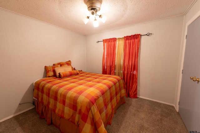 carpeted bedroom with a textured ceiling