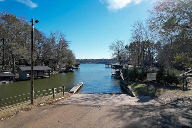 dock area featuring a water view