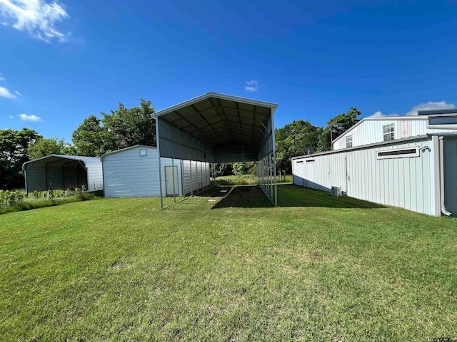 view of yard with a carport