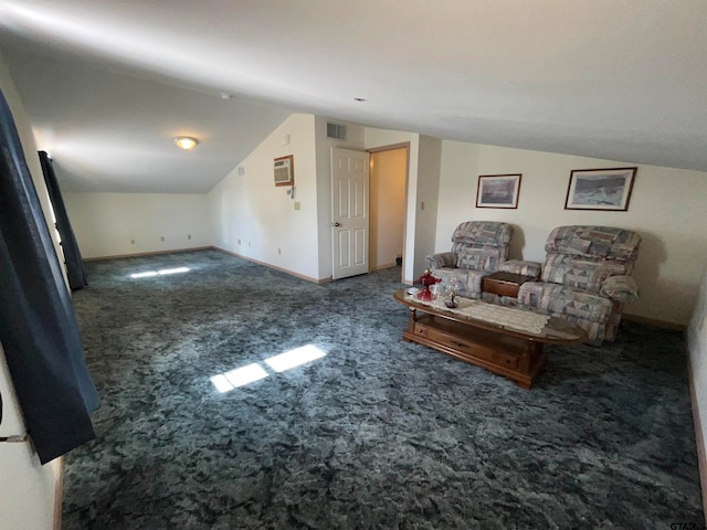 interior space featuring vaulted ceiling and dark carpet