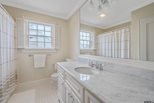 bathroom featuring ornamental molding, vanity, toilet, and tile patterned floors