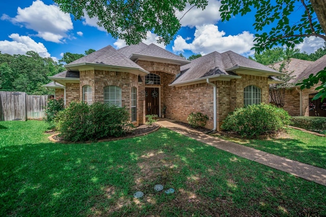 3 Casey Ct, Longview, TX 75604 - view of front of property featuring brick siding and roof with shingles