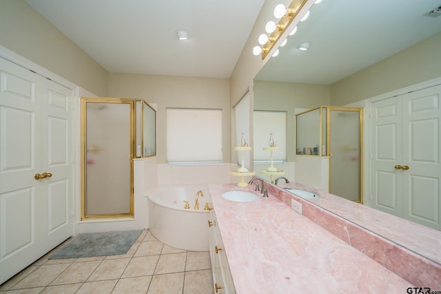 3 Casey Ct, Longview, TX 75604 - bathroom with a shower stall, a garden tub, vanity, and tile patterned floors