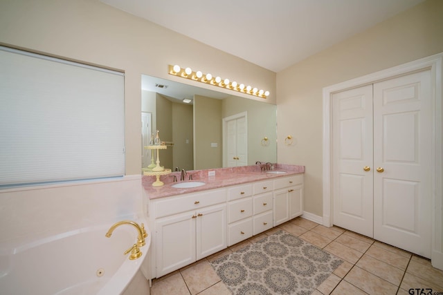 3 Casey Ct, Longview, TX 75604 - full bath featuring double vanity, tile patterned flooring, and a tub with jets