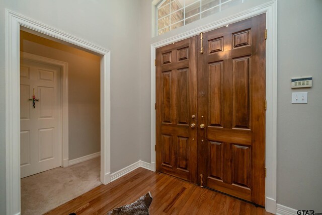 3 Casey Ct, Longview, TX 75604 - entryway with baseboards and light wood-style floors