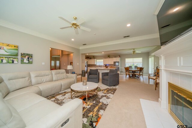 3 Casey Ct, Longview, TX 75604 - living room with a ceiling fan, crown molding, recessed lighting, a fireplace, and light colored carpet