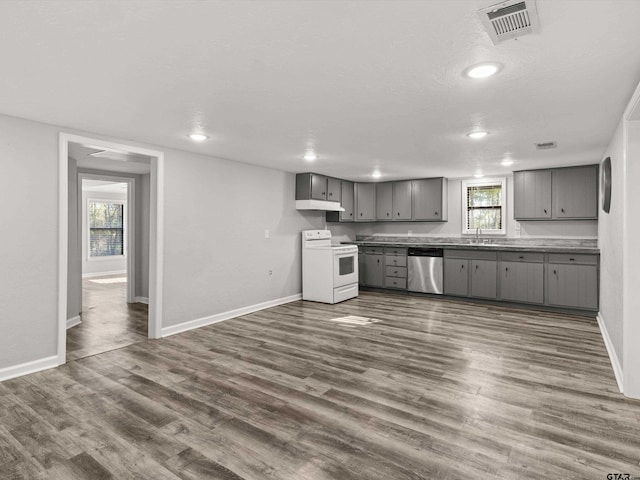 11661 Fm 852, Gilmer, TX 75644 - kitchen with stainless steel dishwasher, baseboards, gray cabinets, a sink, and white electric stove