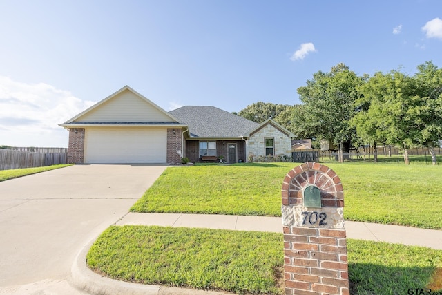 702 Jaxon Dr, Whitehouse, TX 75791 - view of front of house featuring driveway, a garage, brick siding, and a shingled roof