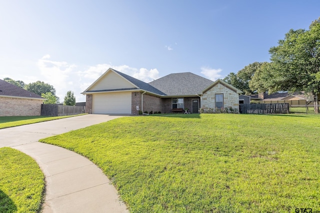 702 Jaxon Dr, Whitehouse, TX 75791 - view of front of property featuring concrete driveway, a garage, brick siding, and stone siding