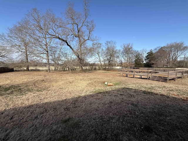 view of yard with a rural view