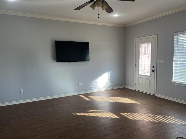 unfurnished living room with ceiling fan, dark hardwood / wood-style floors, and ornamental molding