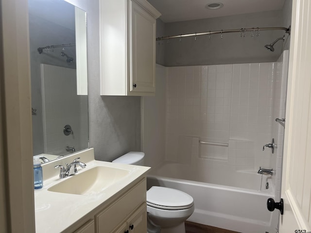 full bathroom with vanity,  shower combination, and toilet