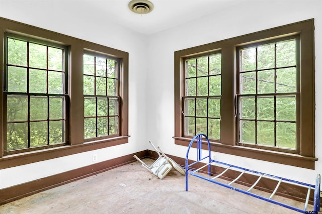 interior space with visible vents and baseboards