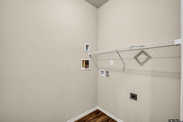 laundry room featuring hookup for a washing machine, dark hardwood / wood-style floors, and hookup for an electric dryer