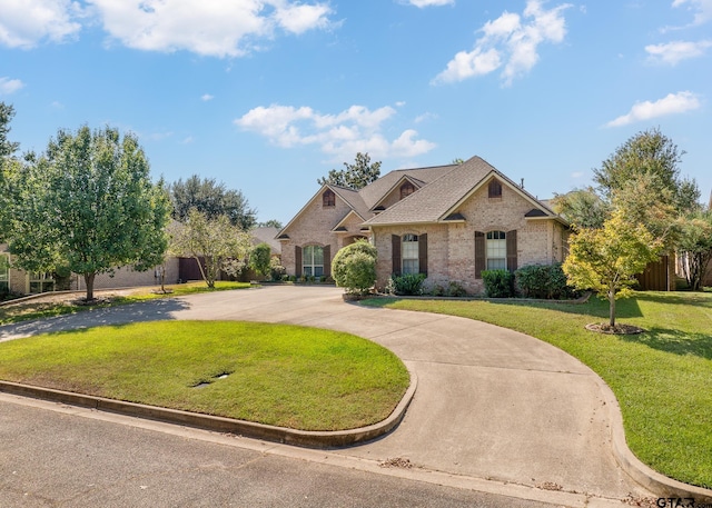 view of front of property with a front lawn