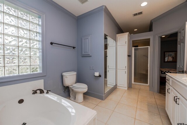 full bathroom with separate shower and tub, tile patterned flooring, toilet, vanity, and crown molding