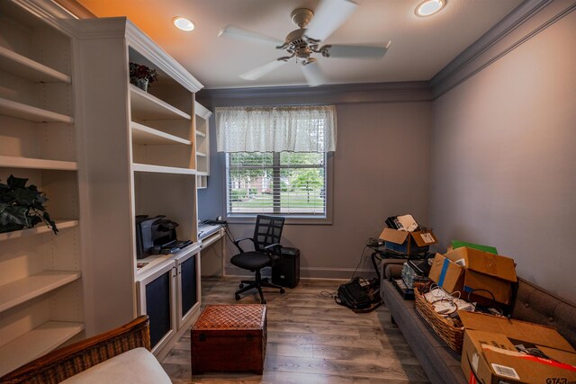 office area with ceiling fan, ornamental molding, and wood-type flooring