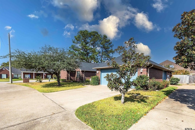 single story home featuring a garage and a front yard