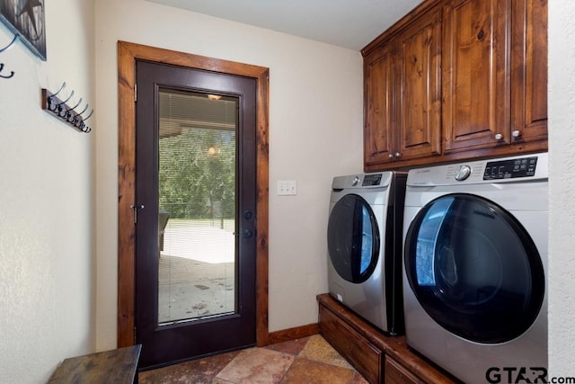 5766 Fm 279, Ben Wheeler, TX 75754 - laundry area with washer and clothes dryer, cabinet space, and stone finish floors