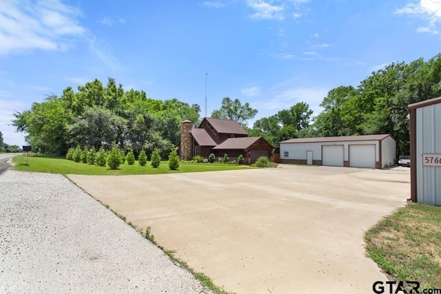 5766 Fm 279, Ben Wheeler, TX 75754 - exterior space featuring a detached garage and an outdoor structure