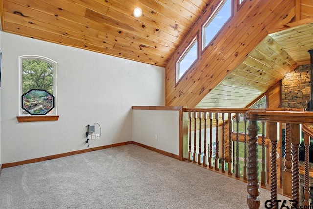 5766 Fm 279, Ben Wheeler, TX 75754 - empty room featuring wooden ceiling, healthy amount of natural light, carpet floors, and vaulted ceiling