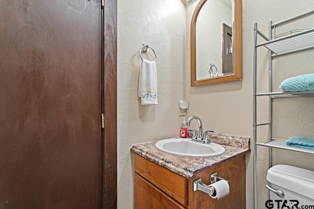 5766 Fm 279, Ben Wheeler, TX 75754 - bathroom featuring vanity and a textured wall
