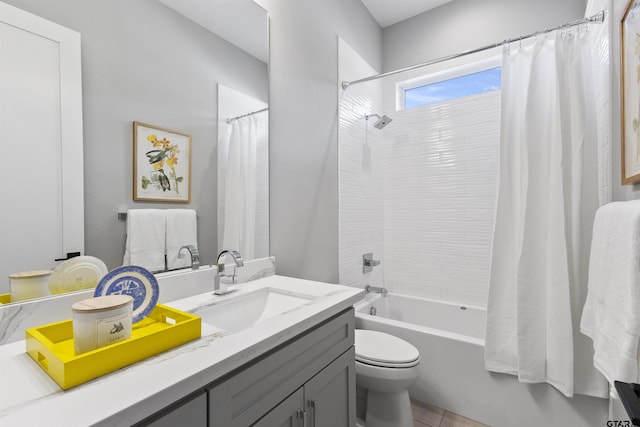 full bathroom featuring vanity, shower / tub combo, and toilet