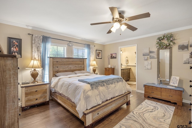 bedroom with ornamental molding, dark hardwood / wood-style flooring, ceiling fan, and connected bathroom