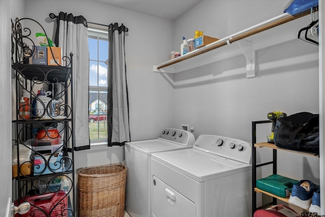 laundry room featuring laundry area and washer and clothes dryer