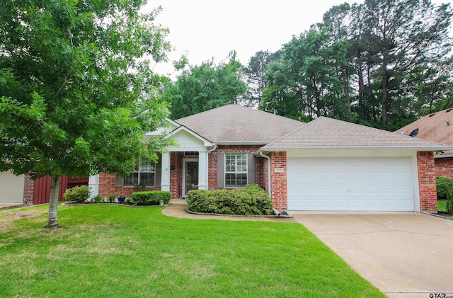 view of front of property with brick siding, a garage, concrete driveway, a front yard, and roof with shingles