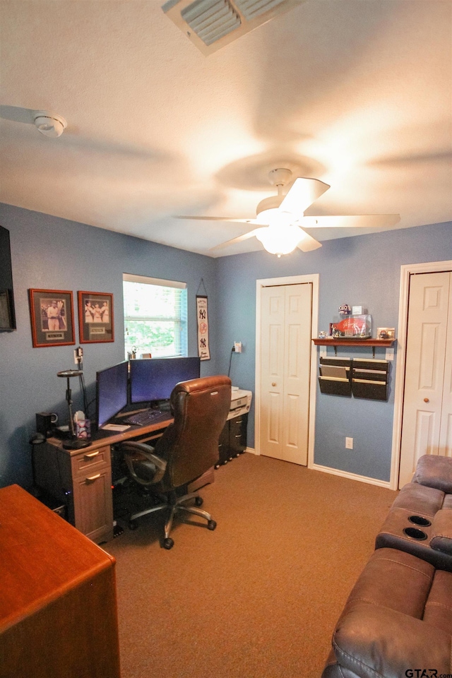 office space featuring carpet flooring and ceiling fan