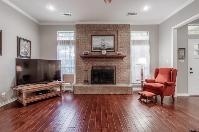 18400 Woodhollow Dr, Flint, TX 75762 - living area with dark wood-style floors, a fireplace, healthy amount of natural light, and crown molding