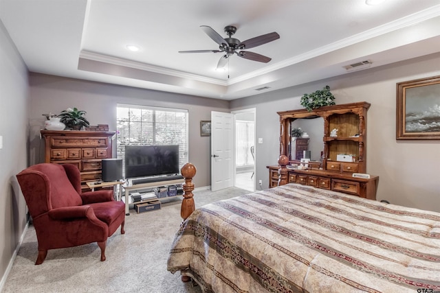 18400 Woodhollow Dr, Flint, TX 75762 - carpeted bedroom featuring ornamental molding, a raised ceiling, ceiling fan, and baseboards