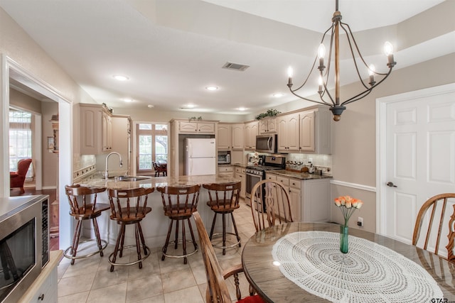 18400 Woodhollow Dr, Flint, TX 75762 - dining space with recessed lighting, a chandelier, and light tile patterned flooring