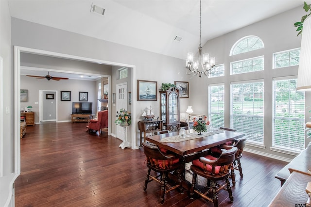 18400 Woodhollow Dr, Flint, TX 75762 - dining space with dark wood finished floors, a chandelier, ceiling fan, and baseboards
