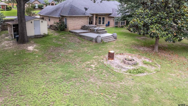 18400 Woodhollow Dr, Flint, TX 75762 - view of green lawn featuring french doors and a deck