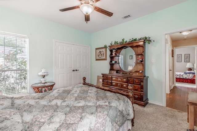 18400 Woodhollow Dr, Flint, TX 75762 - carpeted bedroom with ceiling fan and a closet