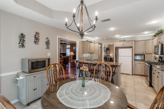 18400 Woodhollow Dr, Flint, TX 75762 - dining room with a chandelier, light tile patterned floors, recessed lighting, and baseboards