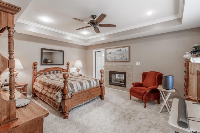 18400 Woodhollow Dr, Flint, TX 75762 - carpeted bedroom with a raised ceiling, crown molding, a fireplace, recessed lighting, and ceiling fan