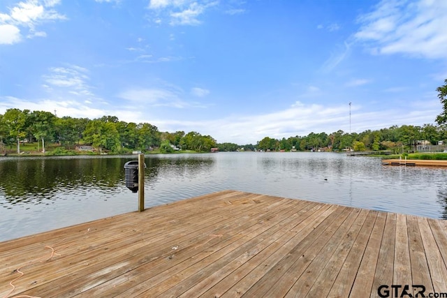 view of dock with a water view